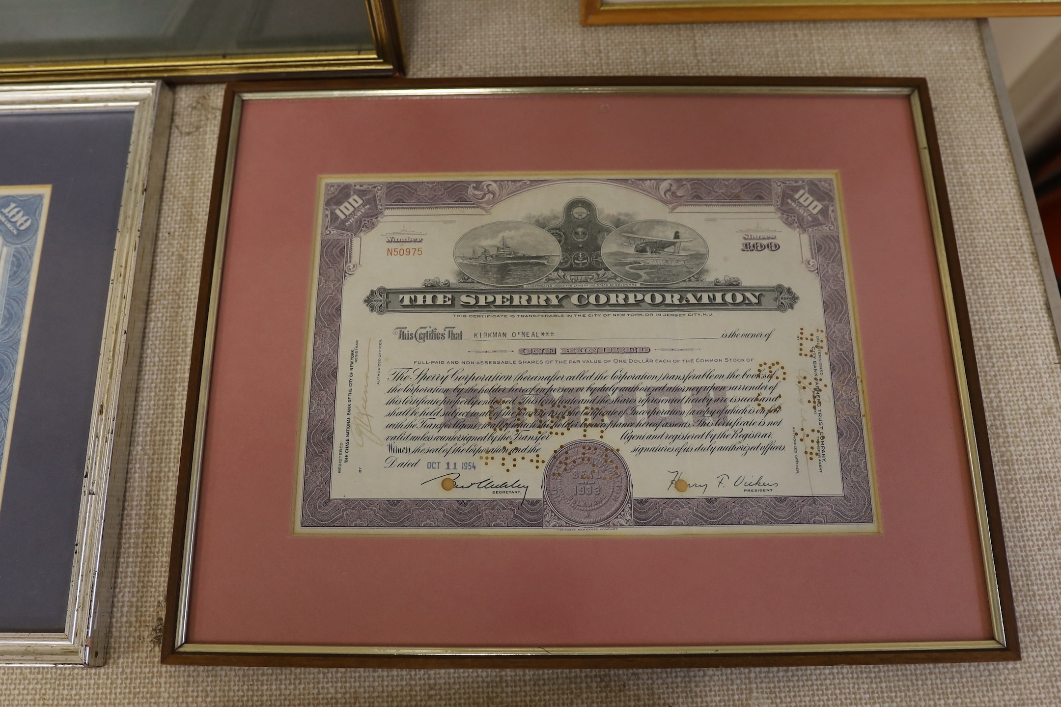 Four framed share certificates and two religious engravings